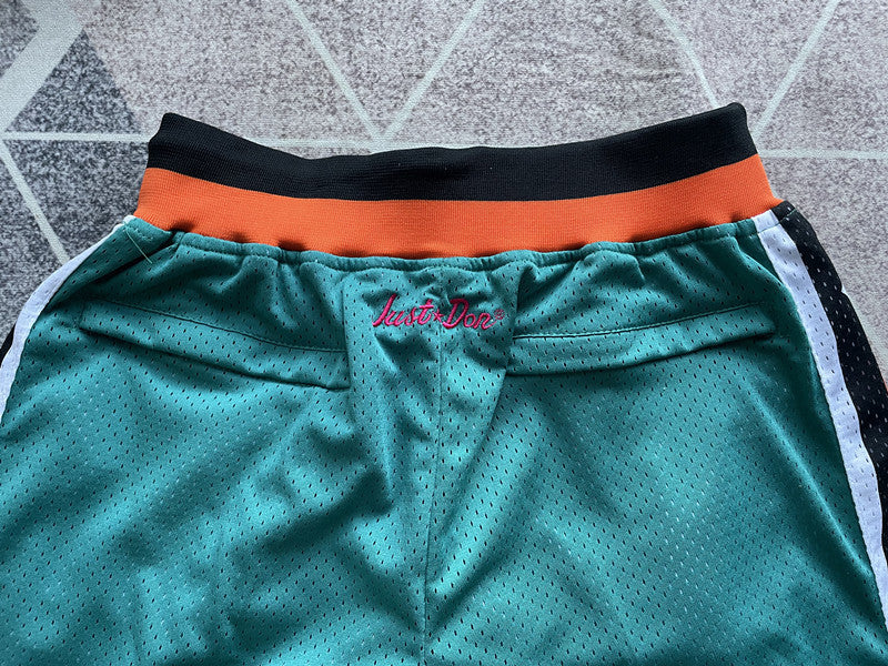 Green All-Star premium basketball shorts, waistband and label detail