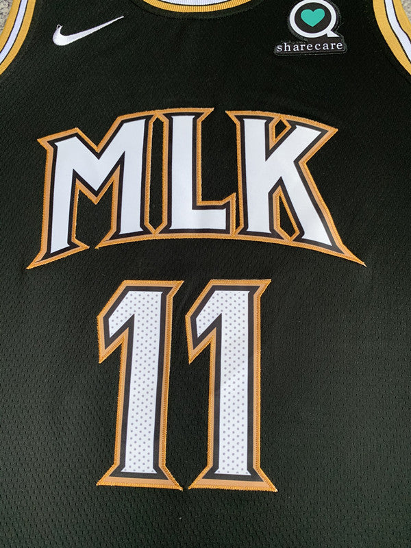 Black Atlanta Hawks basketball jersey, front graphic detail