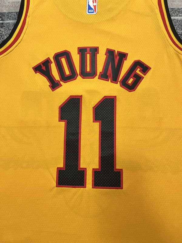 Yellow Atlanta Hawks basketball jersey, back lettering and number detail