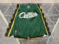 Green Boston Celtics premium basketball shorts, full front view