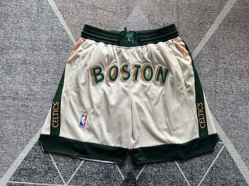 Beige Boston Celtics premium basketball shorts, full front view
