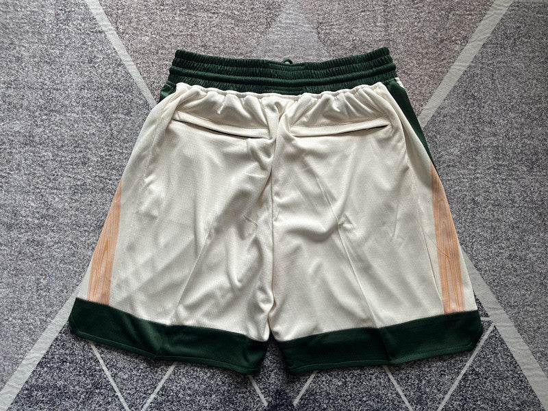 Beige Boston Celtics premium basketball shorts, full back view