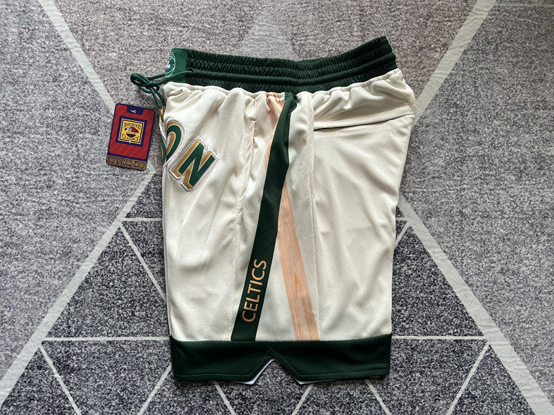 Beige Boston Celtics premium basketball shorts, side panel detail