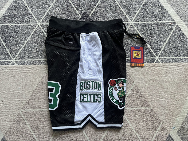 Black Boston Celtics premium basketball shorts, side panel detail
