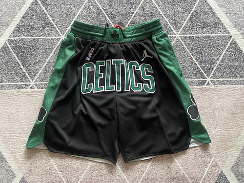 Black Boston Celtics premium basketball shorts, full front view