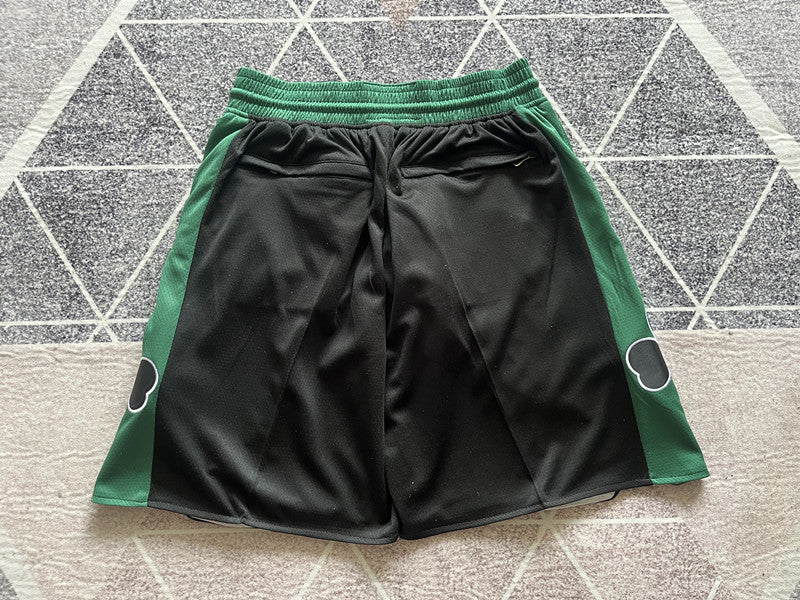 Black Boston Celtics premium basketball shorts, full back view