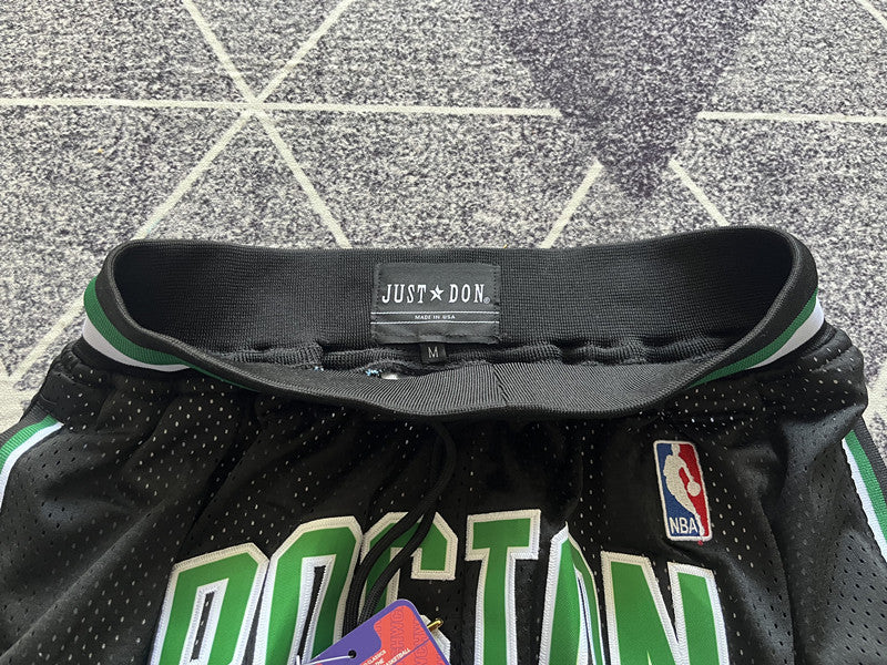 Black Boston Celtics premium basketball shorts, waistband and label detail