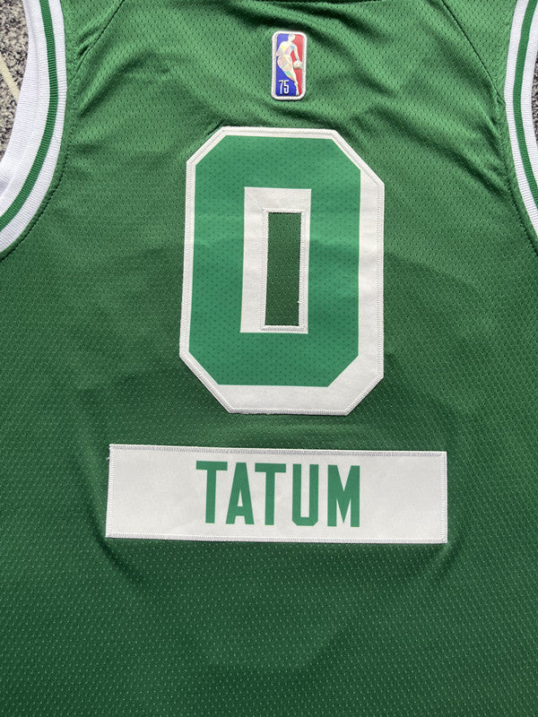 Green Boston Celtics basketball jersey, back lettering and number detail