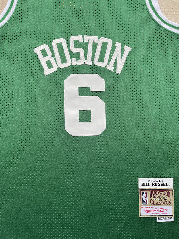 Green Boston Celtics basketball jersey, front graphic detail