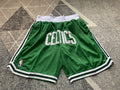 Green Boston Celtics premium basketball shorts, full front view