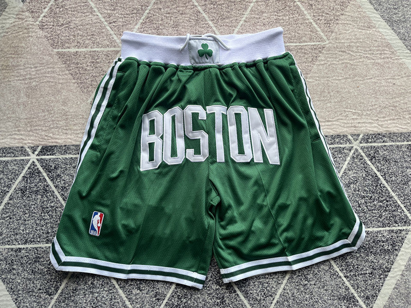Green Boston Celtics premium basketball shorts, full front view