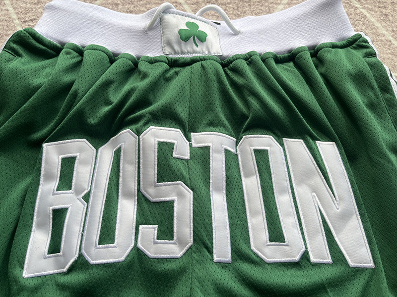 Green Boston Celtics premium basketball shorts, graphic detail