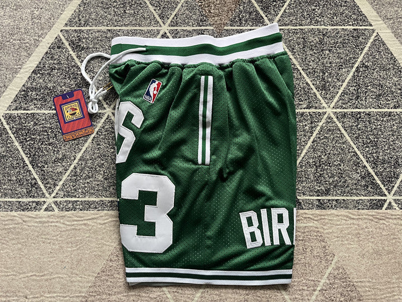 Green Boston Celtics premium basketball shorts, side panel detail