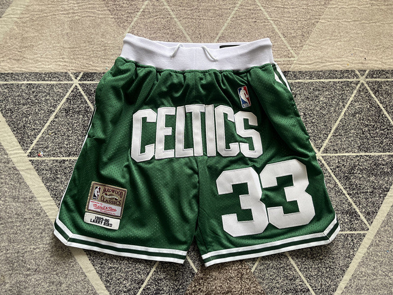 Green Boston Celtics premium basketball shorts, full front view
