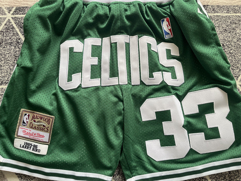 Green Boston Celtics premium basketball shorts, graphic detail