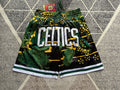 Green Boston Celtics premium basketball shorts, full front view