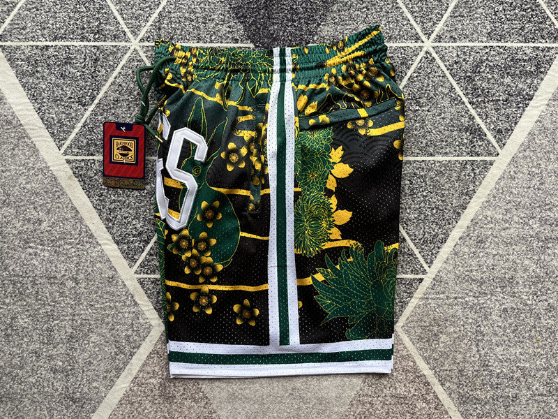 Green Boston Celtics premium basketball shorts, side panel detail