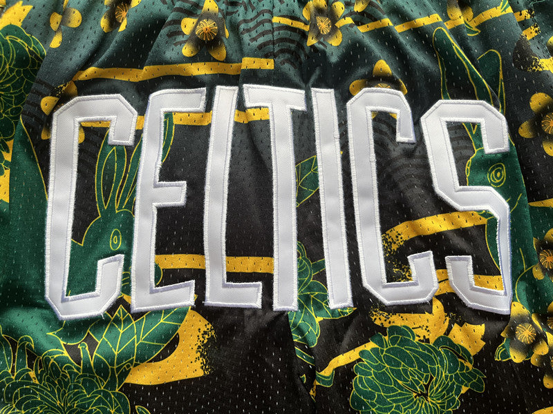 Green Boston Celtics premium basketball shorts, waistband and label detail