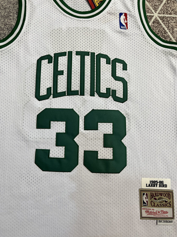 White Boston Celtics basketball jersey, front graphic detail