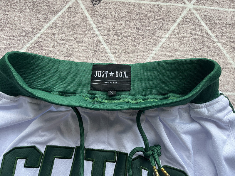 White Boston Celtics premium basketball shorts, waistband and label detail