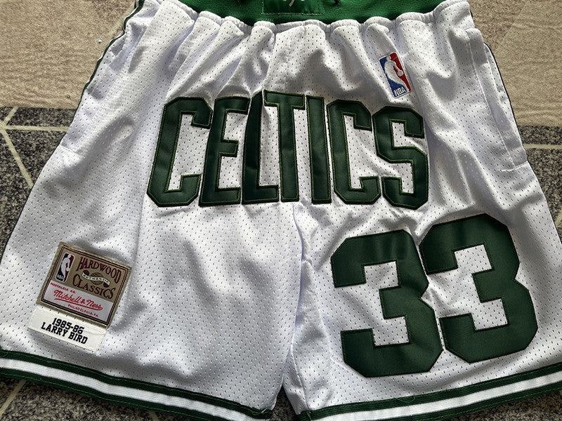 White Boston Celtics premium basketball shorts, graphic detail