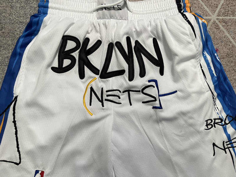 White Brooklyn Nets premium basketball shorts, graphic detail