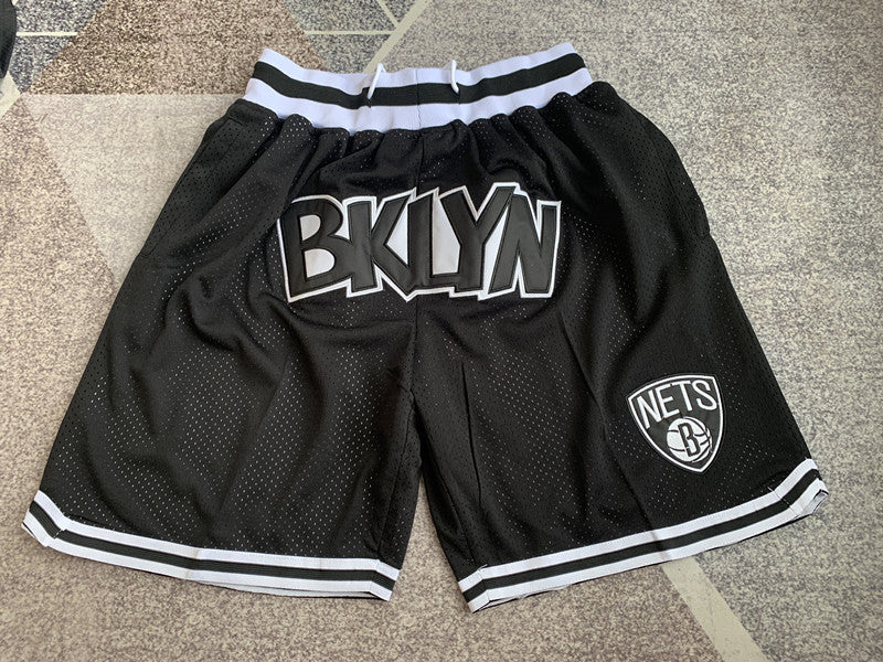 Black Brooklyn Nets premium basketball shorts, full front view