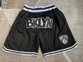 Black Brooklyn Nets premium basketball shorts, full front view