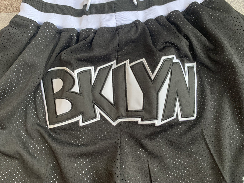 Black Brooklyn Nets premium basketball shorts, graphic detail