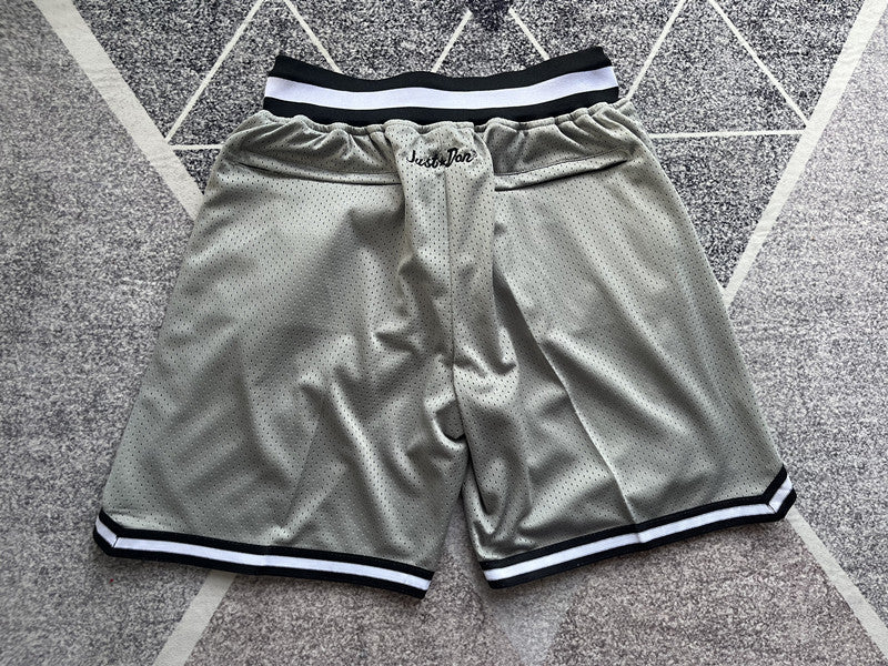 Gray Brooklyn Nets premium basketball shorts, full back view