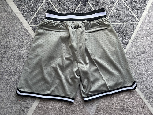 Gray Brooklyn Nets premium basketball shorts, full back view