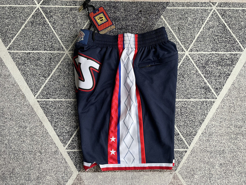 Navy Brooklyn Nets premium basketball shorts, side panel detail