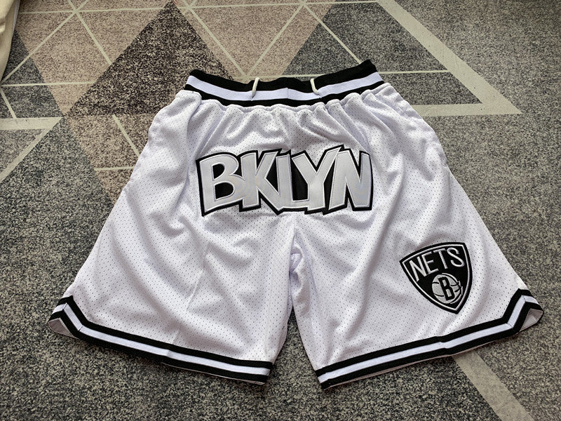 White Brooklyn Nets premium basketball shorts, full front view