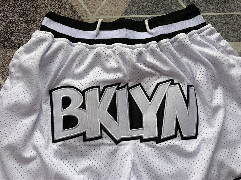 White Brooklyn Nets premium basketball shorts, graphic detail