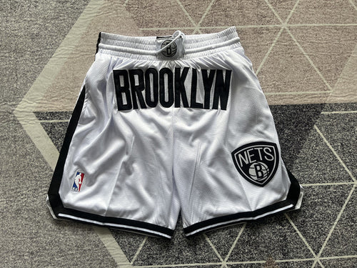 White Brooklyn Nets premium basketball shorts, full front view