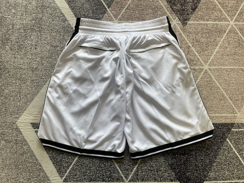 White Brooklyn Nets premium basketball shorts, full back view