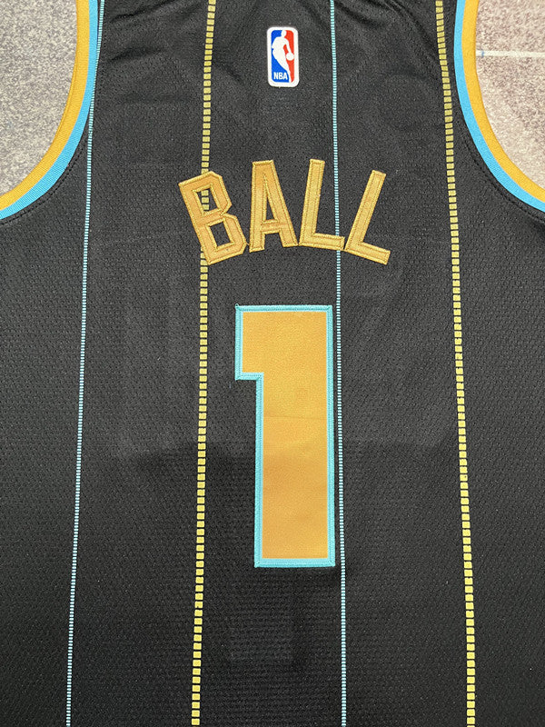Black Charlotte Hornets basketball jersey, back lettering and number detail