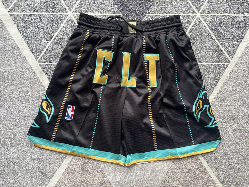 Black Charlotte Hornets premium basketball shorts, full front view