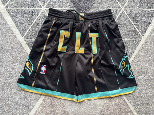 Black Charlotte Hornets premium basketball shorts, full front view