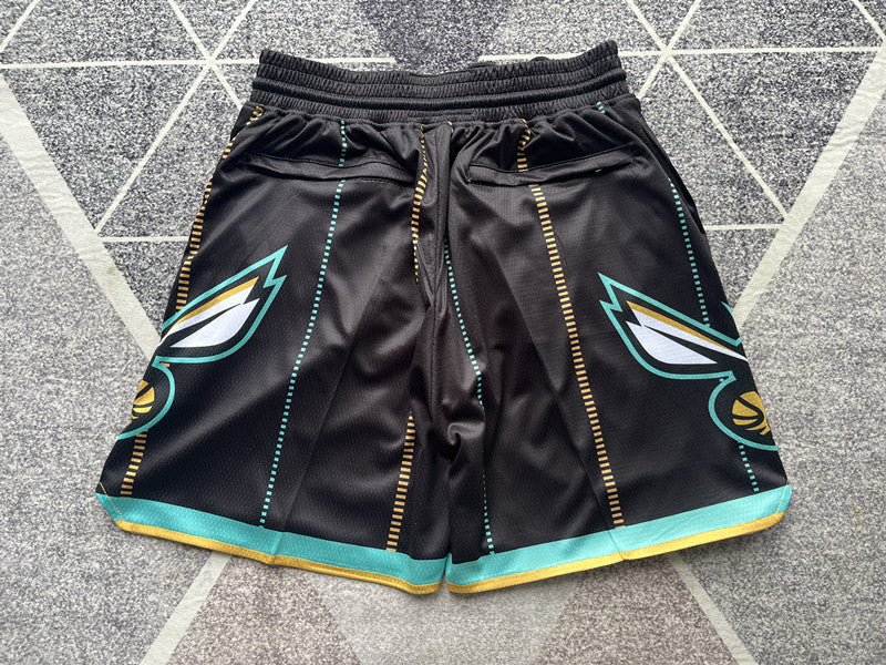 Black Charlotte Hornets premium basketball shorts, full back view