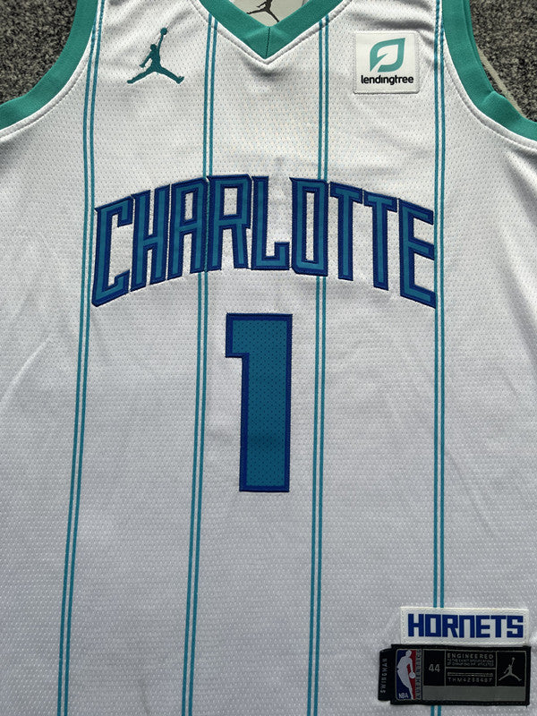 White Charlotte Hornets basketball jersey, front graphic detail