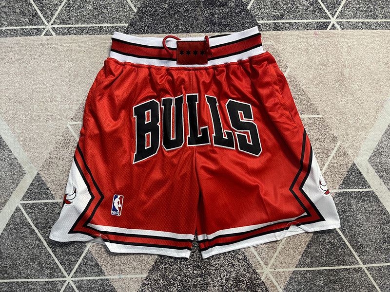 Red Chicago Bulls premium basketball shorts, full front view