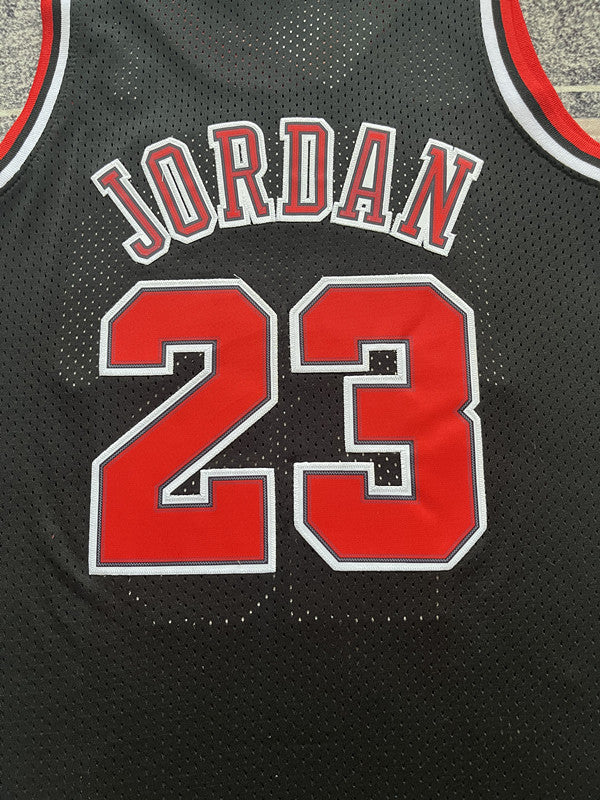 Black Chicago Bulls basketball jersey, back lettering and number detail