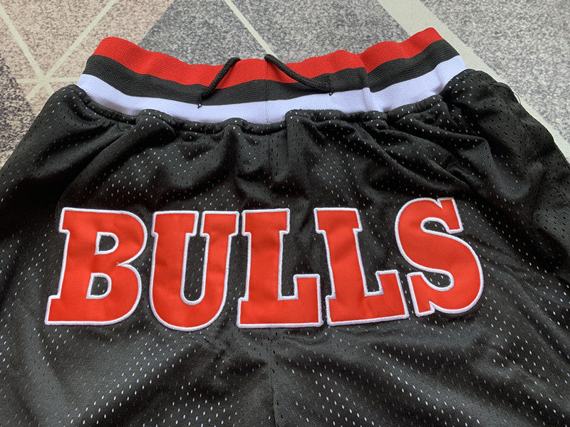 Black Chicago Bulls premium basketball shorts, graphic detail