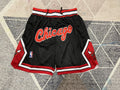 Black Chicago Bulls premium basketball shorts, full front view