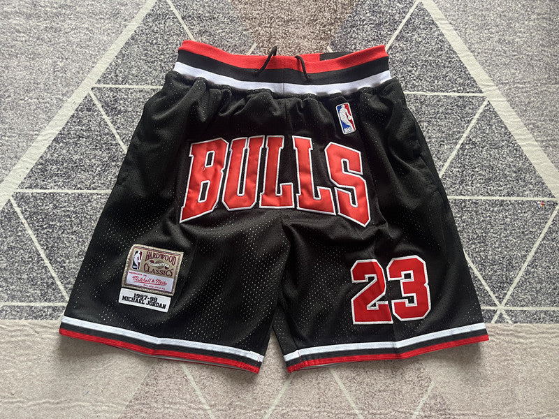 Black Chicago Bulls premium basketball shorts, full front view