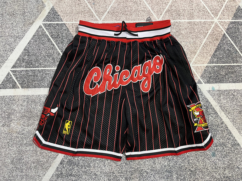 Black Chicago Bulls premium basketball shorts, full front view