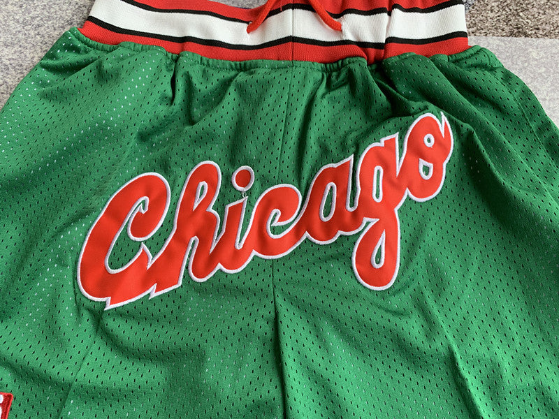 Green Chicago Bulls premium basketball shorts, graphic detail