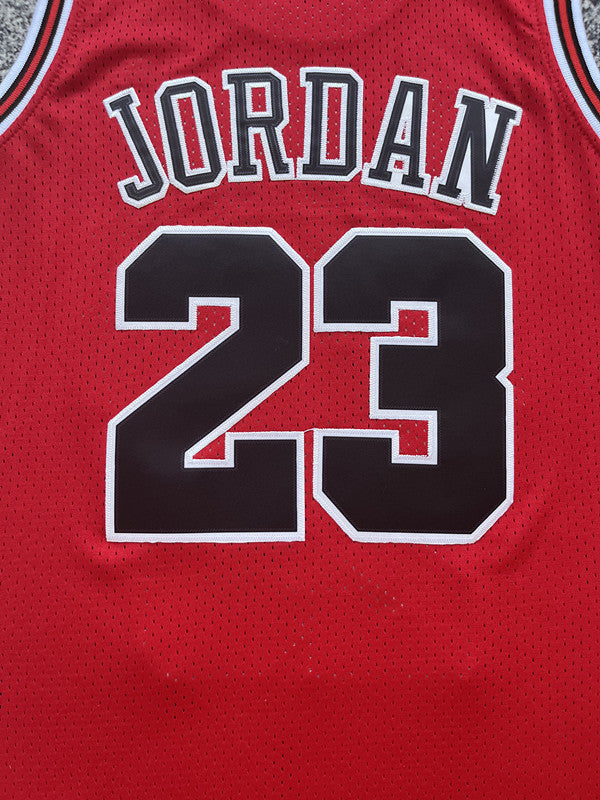 Red Chicago Bulls basketball jersey, back lettering and number detail