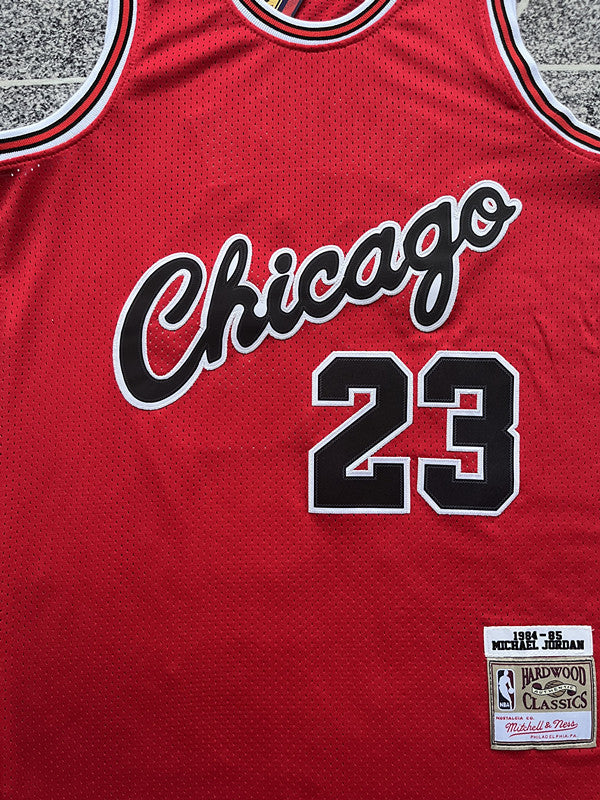 Red Chicago Bulls basketball jersey, front graphic detail